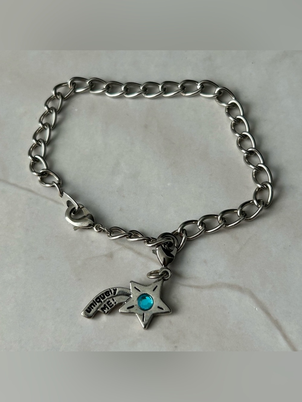 Silver Star Charm Bracelet with Blue Gem